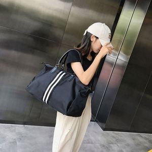 Échantillon gratuit Sac d'excursion personnalisé Sac de voyage portable Sac de sport en tissu imperméable de luxe Emballage du produit - Product Image 4