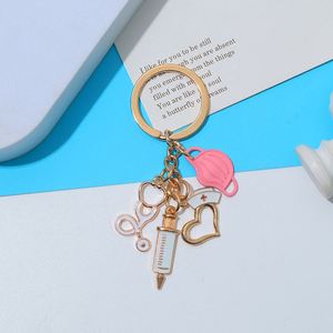 Porte-clés créatif en métal pour médecins, masque, stéthoscope, seringue, pendentif, porte-clés pour personnel médical, infirmière, cadeau commémoratif - Product Image 1