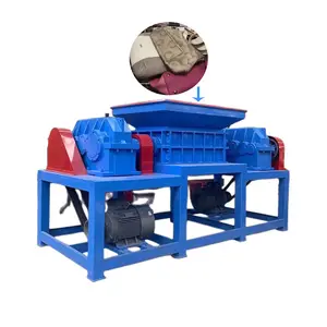 Cardboard shredder crushes textile packaging materials and discarded items twin shaft shredder