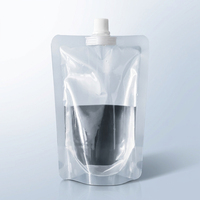 Pochette souple transparente en PE de 0,2 mm anti-fuite avec bec verseur central pour l'emballage de jus et de boissons liquides
