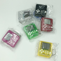 Nouvelle console de jeu portable mini de poche avec 99 jeux rétro nostalgiques classiques, modèle à piles bouton, format mini porte-clés