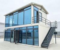 Villa modulaire de luxe à deux étages, préfabriquée, idéale pour complexe hôtelier, gîte panoramique, bureau ou grande villa en verre à deux étages.