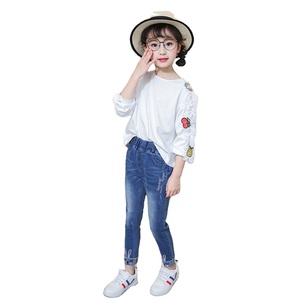 Pakaian Anak Buatan Cina Online Gaya Korea Celana <span class=keywords><strong>Jeans</strong></span> Denim Lembut Berumbai Model Ketat untuk Anak Perempuan - Product Image 1