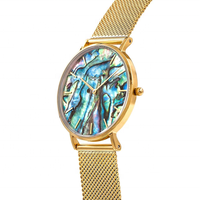 Montre à cadran en nacre d'ormeau en gros, montre à bracelet en acier inoxydable à mailles tendance pour femme