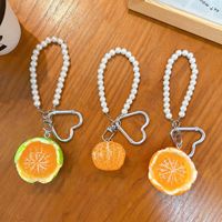 Realistische gepelde sinaasappel fruit sleutelhanger met parelketting, schattig voedselvormig tasbedeltje voor vrouwen, cadeau accessoires