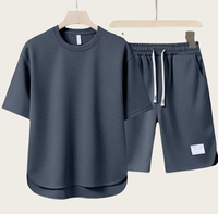 Costume à manches courtes avec logo personnalisé, motif brodé, col rond, t-shirt haut de gamme à manches courtes de couleur unie pour hommes