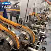 Machine à biscuits sandwichs haute efficacité Skywin avec ensacheuse à flux continu