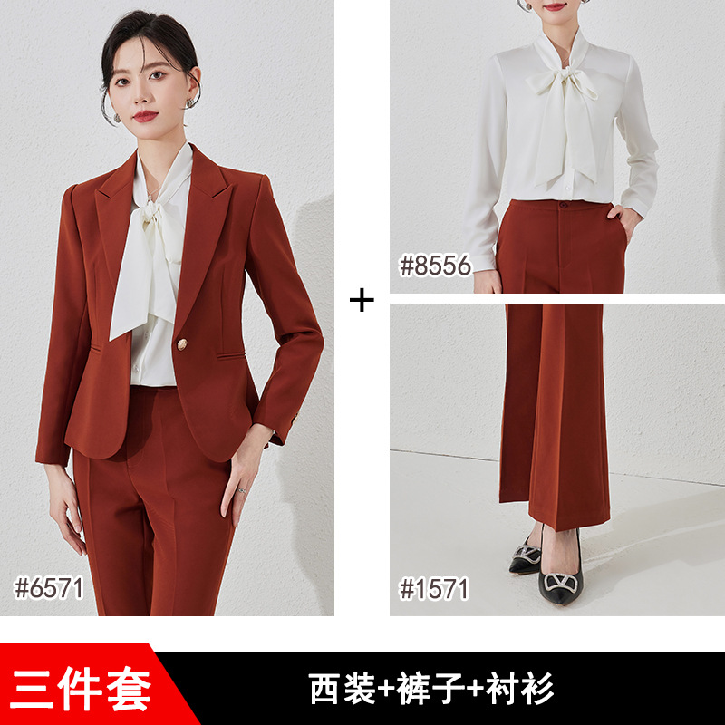 brick red suit, white shirt and trousers