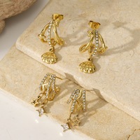 Boucles d'oreilles pendantes SA Jewelry en acier inoxydable plaqué or 18 carats, motif coquillage en forme de croix, sertissage clos de zircon, tendance et haut de gamme