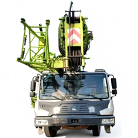Grue mobile sur camion d'occasion QY70K 11, 70 tonnes, avec flèche de 58 m, pour levage hydraulique intensif