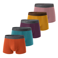 Sous-vêtements en gros OEM avec logo personnalisé, extensibles dans quatre directions, en spandex, couleur unie, respirants, confortables, certifiés CE, caleçons et boxers pour hommes