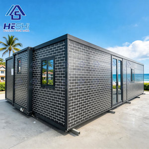 Casa Contenedor Moderna HESHi de 20 Pies, Módulo de Vivienda Prefabricado, Diseño Rectangular, Estructura de Acero, Acabado Ladrillo Negro - Product Image 1
