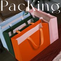 Sac en papier avec ceinture intérieure en carton ivoire et impression sérigraphique pour chaussures et chaussettes, en stock