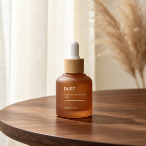 ขวดแก้วสีชาขุ่นขนาด 30/40 มล. พร้อมหัวหยดแบบหยดน้ำและฝาไม้ลายไม้สุดหรู สำหรับบรรจุภัณฑ์น้ำมันหอมระเหย เอสเซนเชียล ออยล์ และเซรั่ม - Product Image 1