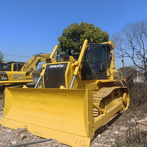 รถดันดินตีนตะขาบ Komatsu D65 EX มือสองจากญี่ปุ่น ใช้เครื่องยนต์ SAA6D114E ขนาดกลาง พร้อมริปเปอร์ สำหรับงานก่อสร้างและปรับระดับพื้นดิน - Product Image 1