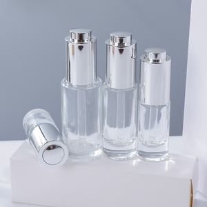 Flacon de lotion en verre transparent haut de gamme avec tête de pompe à pression 20ml/100ml, diffuseur à bâtonnets pour <span class=keywords><strong>essence</strong></span> faciale de luxe, crème pour le visage, <span class=keywords><strong>mascara</strong></span> - Product Image 3