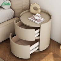 Chevet rond en cuir de luxe Wayon, table de chevet moderne à 2 tiroirs avec détails cousus pour chambres à coucher haut de gamme