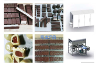 Nouvelle ligne de moulage de chocolat au pistache de Dubaï avec machine de dépose, prise européenne, garantie 1 an, 1200 kg pour barres de chocolat