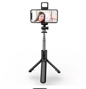 工厂热卖<span class=keywords><strong>3</strong></span>合1自粘三脚架S03带填充灯可折叠360无线遥控手机支架 - Product Image 1