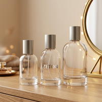 Flacon de parfum cylindrique en verre borosilicate transparent vide de 30 ml, 50 ml, 100 ml, rechargeable, avec atomiseur et bouchon, impression de logo personnalisée