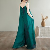 Nouvelle collection été 2026 – Combinaison pantalon large imprimée verte à fines bretelles et noué devant pour femme grande taille – Idéale pour les vacances à la plage et les loisirs – Style rétro