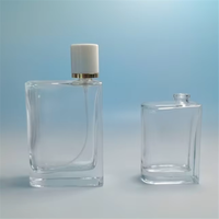 Bouteille de parfum en verre transparent rectangulaire unique de 100ml vide pour diffuseur de parfum pour femme avec pulvérisateur à pompe pour cadeau