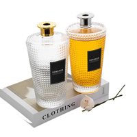 Bouteille diffuseur à roseaux en verre transparent rond de 1000 ml pour aromathérapie, avec zone d'étiquetage personnalisable pour l'emballage d'huiles essentielles - Vente en gros