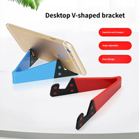 Support de téléphone mini en forme de V, pliable, réglable, idéal pour une utilisation sur le bureau, portable, adapté aux autres téléphones, tablettes, support triangulaire