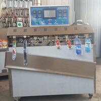 Vloeistof Semi Automatische Tuit Zakje Vulmachine Handleiding Stand Up Tas Doy Pack Vulmiddel En Capper Machines Goedkope Prijs Voor koop
