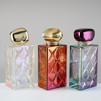 Producción en Masa de Botellas de Perfume de Vidrio Vacías Iridiscentes de 100 ml con Tapa Metálica Morada para Perfume de Mujer