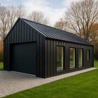 Bâtiment préfabriqué en acier durable, garage pour deux voitures dans un jardin périurbain
