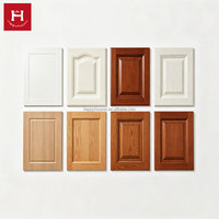 Portes d'armoires de cuisine sur mesure de style européen Happy Houses, en bois massif noyer et chêne, avec inserts en acier, pour projets.