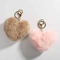Vente en gros de porte-clés en forme de cœur de 10 cm avec pompon, pompons en fausse fourrure de lapin, porte-clés moelleux et bouffant, chaîne de porte-clés, porte-clés en pompon