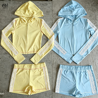 Setelan Olahraga Wanita Berkualitas Tinggi dengan Logo Kustom, Jaket Hoodie Ritsleting Ketat dan Celana Pendek Lipat 2 Potong