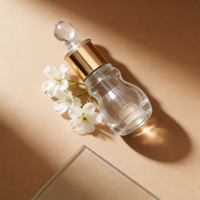 Vente en gros de flacons compte-gouttes en verre transparent personnalisables de 6 ml et 12 ml, en forme de gourde, pour huiles essentielles, avec bouchons compte-gouttes à col doré