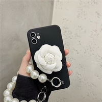 Étui de téléphone portable tout-en-un fait main au design épuré avec support Camellia pour iPhone 12/13/15/16 Pro Max
