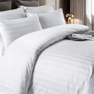 โรงแรมผ้าฝ้าย 4 ชิ้นผ้าปูที่นอนผ้านวมคลุมโรงแรมเครื่องนอนสีขาวชุดเครื่องนอนโรงแรม