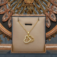 Collier pendentif double cœur plaqué or de luxe, chaîne croisée en acier inoxydable, bijoux de mariage et de fête pour femmes et jeunes filles