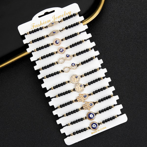Nueva llegada al por mayor 12 piezas Evil Eye Fatima Hand Black Bead <span class=keywords><strong>String</strong></span> Bracelet hecho a mano tejido personalizado Set pulsera - Product Image 6