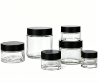 Pot en verre transparent ambré noir personnalisé avec logo OEM, vide, 5g-100g, pour crème visage, sérum, emballage cadeau cosmétique de luxe.
