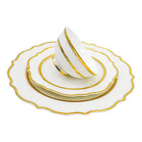 Service de table minimaliste de style européen d'inspiration chinoise avec incrustation dorée peinte à la main et gaufrage sur porcelaine fine