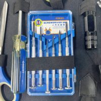 Ensemble d'outils portables pour la maison, comprenant un marteau, une clé à molette réglable, des pinces, des ciseaux, un jeu de tournevis et un sac de rangement