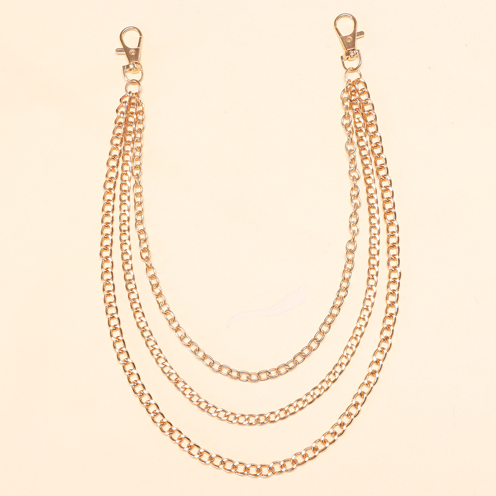 Cadena para pantalón dorada multicapa.