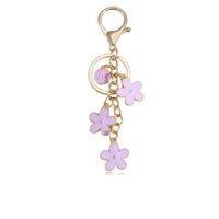 Charm de sac à fleurs personnalisé mignon et élégant de 26 lettres et porte-clés de téléphone pour les étudiantes