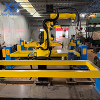 Cellule de soudage MIG modulaire à double poste pour robot unique, portée de 1,5 m avec positionneur de tourelle et de contre-tourelle