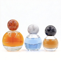 Vente en gros d'usine 30 50 80ml Flacons de parfum de luxe en verre cosmétique Flacons vides sphériques transparents avec bouchon à bille