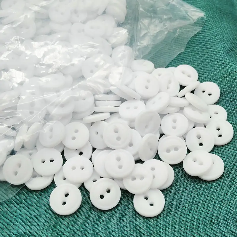 18L 11.5mm 2 holes fish eye resin button with rim in dull white color, dyeable resin button