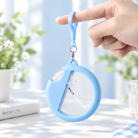 Flacon pulvérisateur de parfum vide en silicone rond de 25 ml avec porte-clés, logo personnalisé, vente en gros, rechargeable, format carte