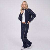Ensemble de survêtement personnalisé pour femme, veste bomber courte zippée en interlock avec passepoil contrastant et pantalon de jogging large, ensemble 2 pièces