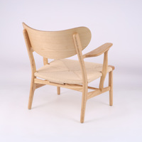 Mobilier de loisirs moderne nordique accoudoir chaise en bois cadre en bois massif siège en rotin pour salon chaise longue